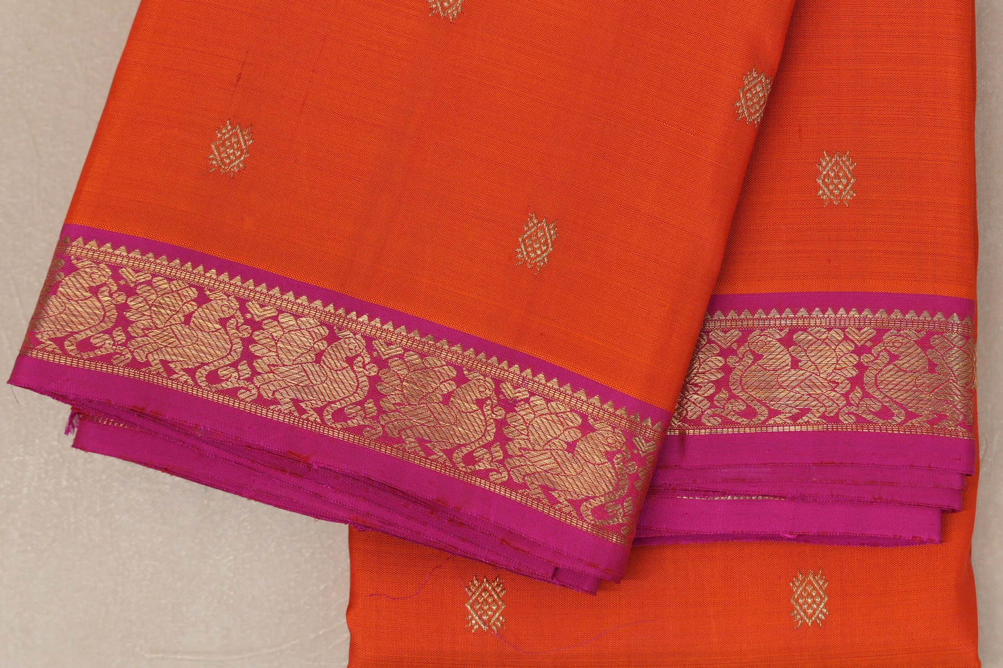 Bright Orange Heirloom Kanjivaram Silk Saree border zoom