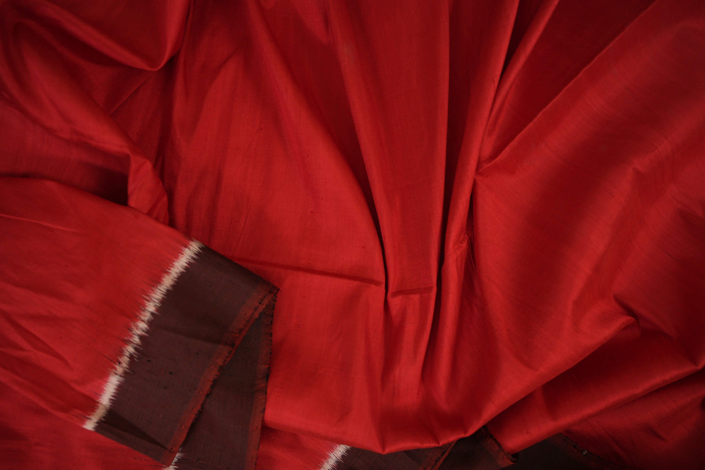 Reddish Orange Ikat Silk Saree Zoom