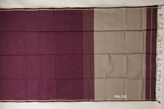 Maheshwari silk cotton saree spread flat, showing a wine maroon body, sandal beige pallu, deep maroon border and dark tassels.