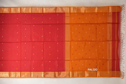 Spread-out Maheshwari silk cotton saree with a tomato red dotted body, mustard orange dotted pallu, orange borders, red end stripe and tassels.
