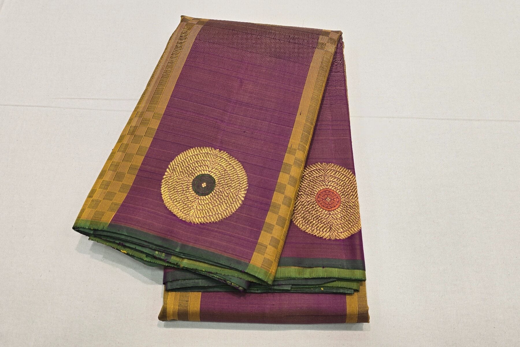 Pure Kanjivaram silk saree for South Indian wedding, with temple motifs
