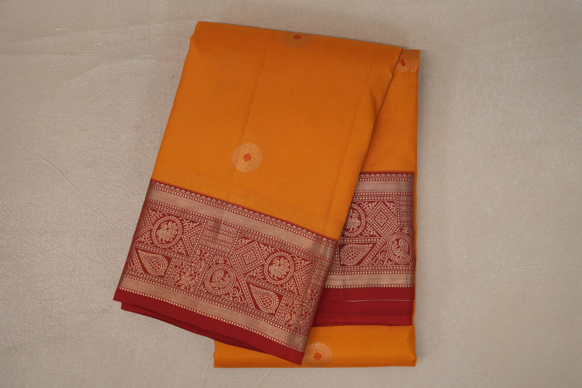folded Mango Orange Soft Silk Saree