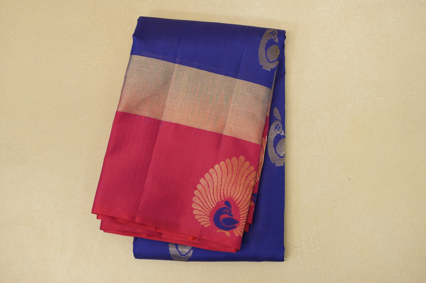 folded Deep Blue with Rani Pink Borders Light Weight Kanjivaram Silk Saree 
