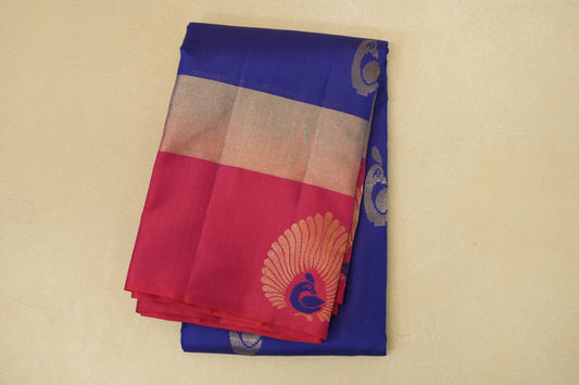 folded Deep Blue with Rani Pink Borders Light Weight Kanjivaram Silk Saree 