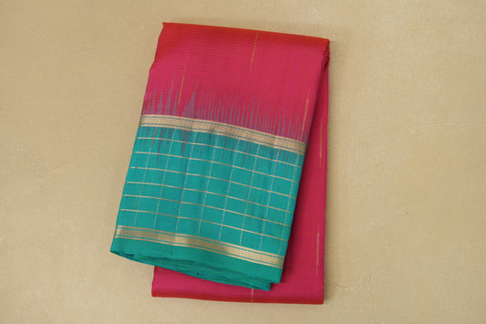 folded Bright Pink with Aqua Blue Borders Light Weight Kanjivaram Silk Saree