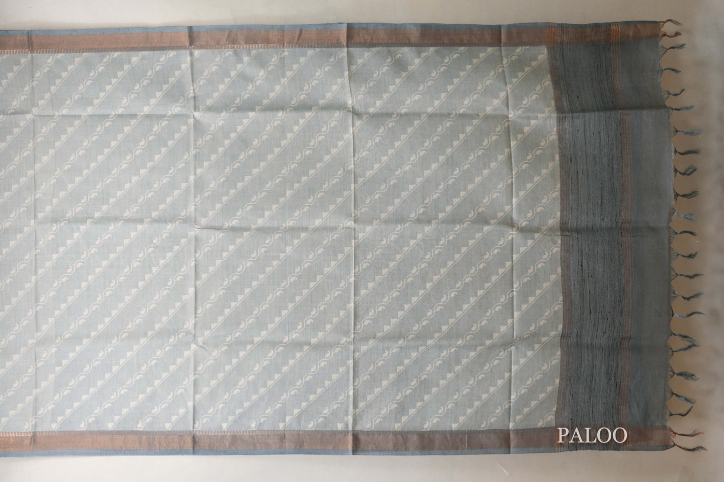 Pastel bluish grey with Dark Bluish Grey Borders Bhagalpur Tussar silk saree paloo