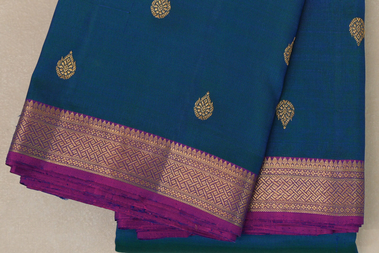 Peacock Blue with Magenta borders Plant based Kanjivaram Silk Saree border