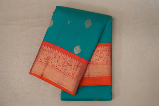 folded Rama Green Soft Silk Saree 