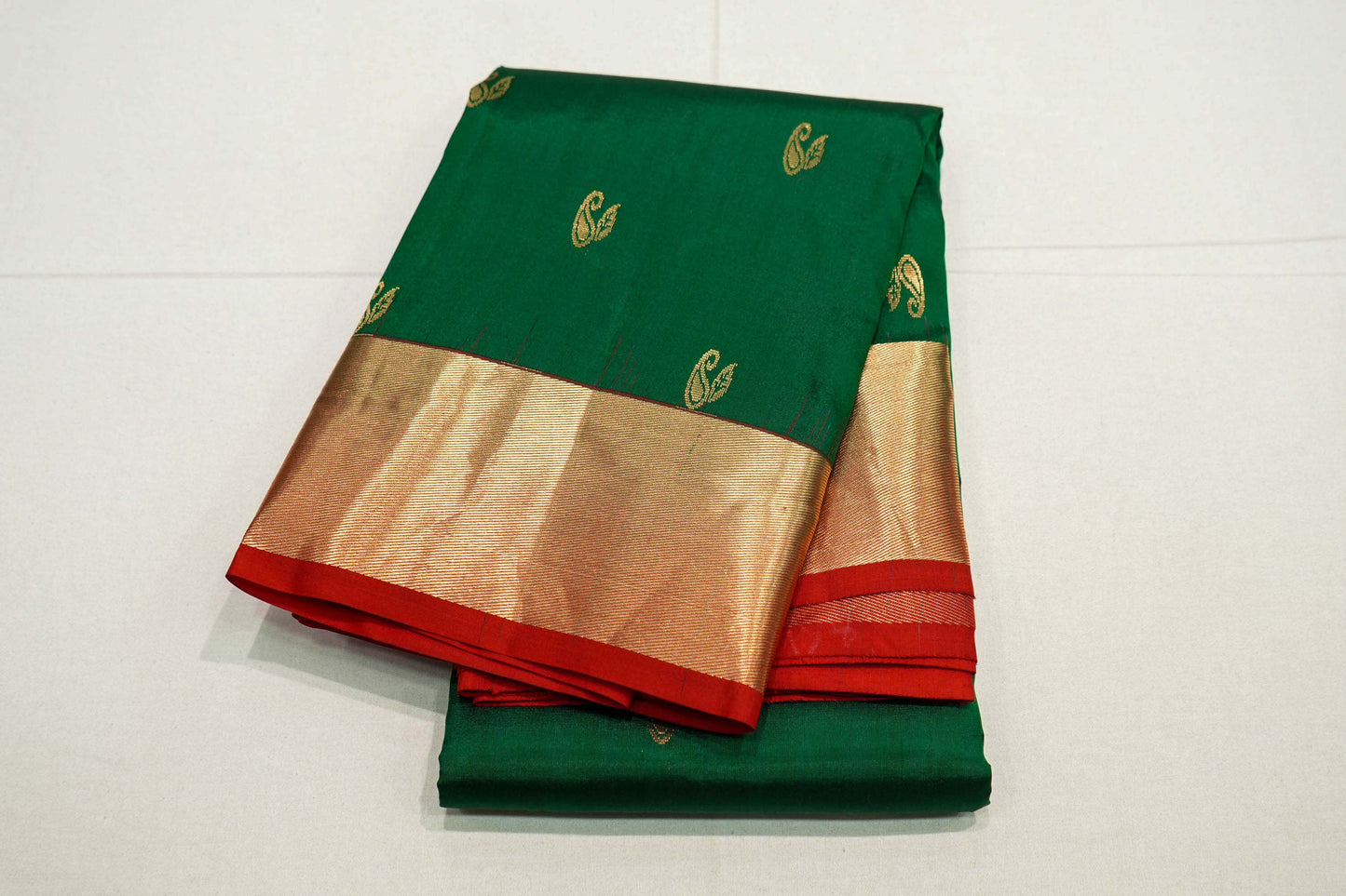 Bottle green kanchipuram silk saree