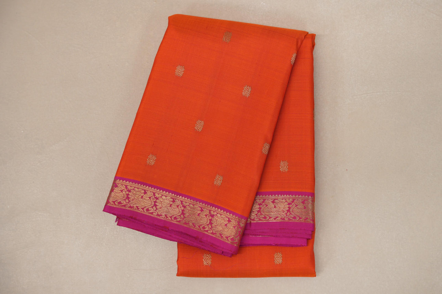Bright Orange Heirloom Kanjivaram Silk Saree folded 