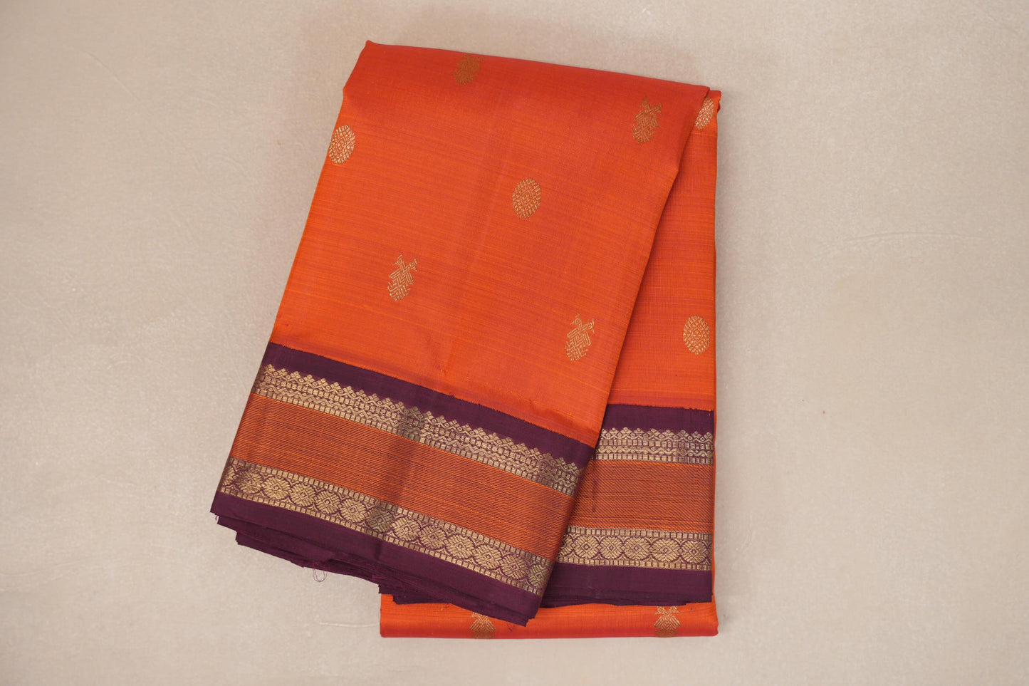 folded Orange with Deep Magenta Borders Heirloom Kanjivaram Silk Saree