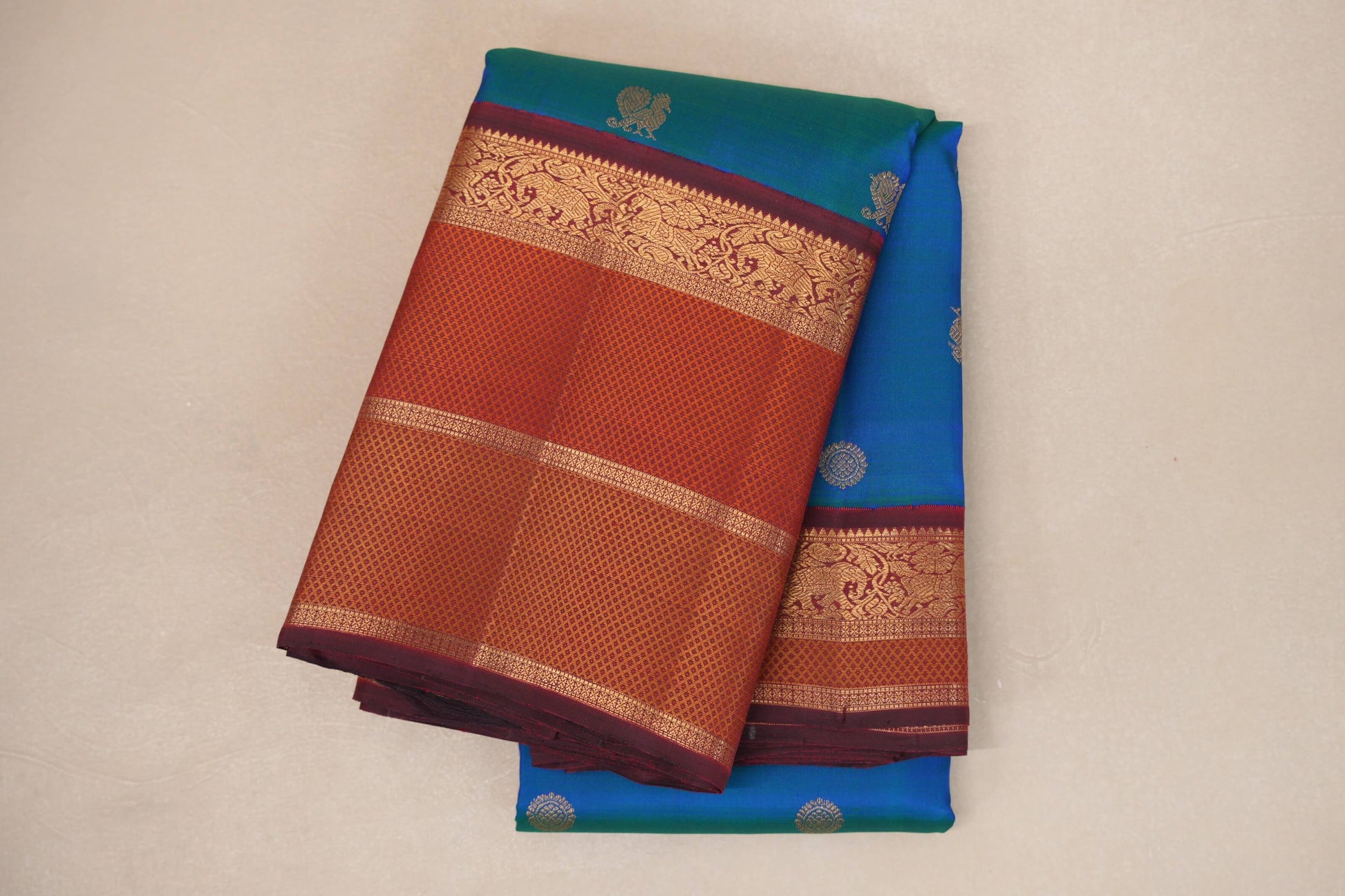 Peacock Blue with Multi Color Borders Heirloom Kanjivaram Silk Saree folded 