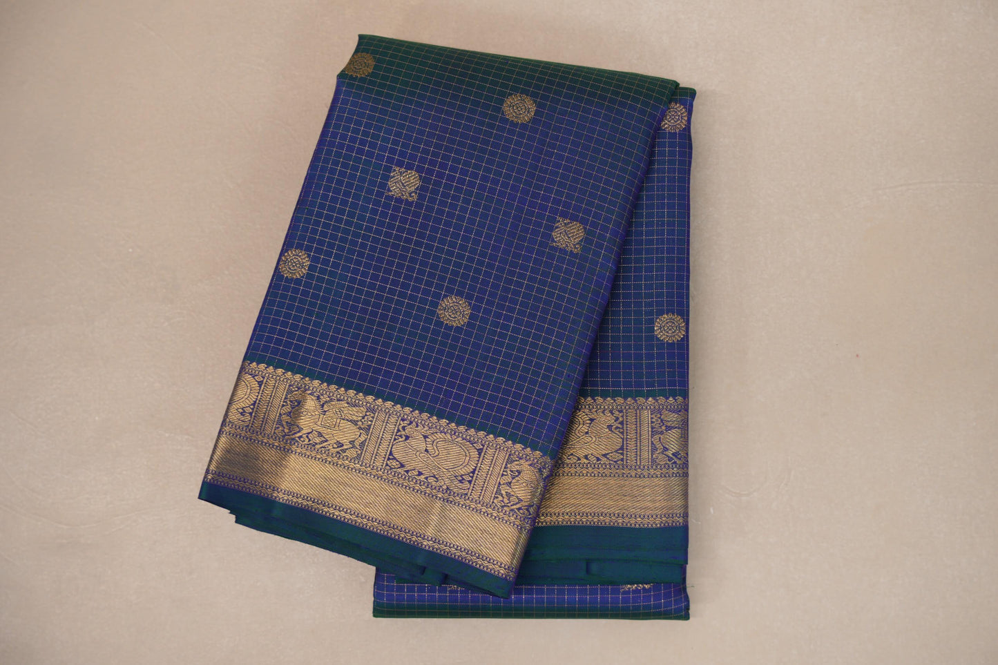 folded Peacock Blue Borders Heirloom Kanjivaram Silk Saree