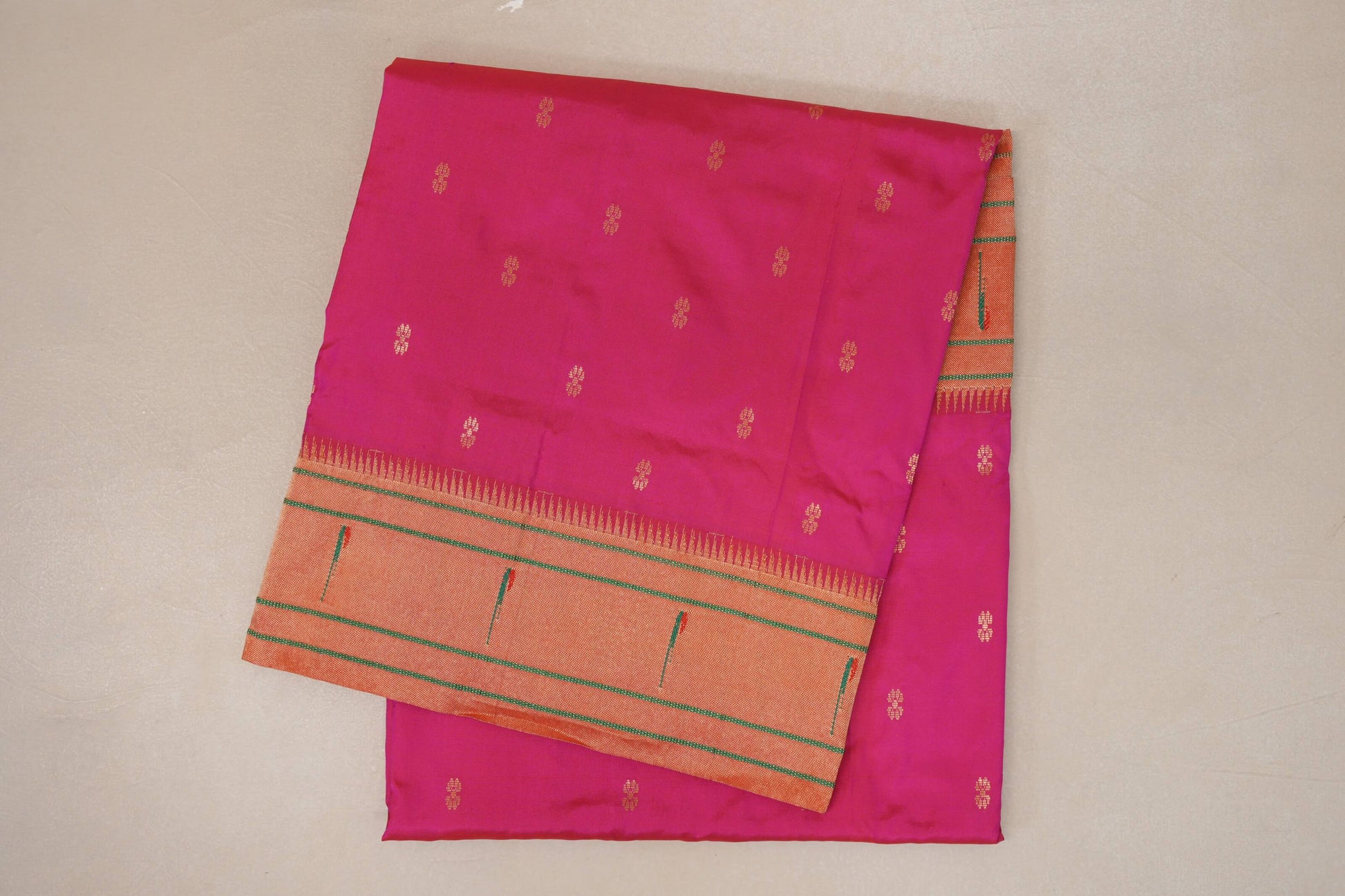 folded Rani Pink Paithani Inspired Soft Silk Saree