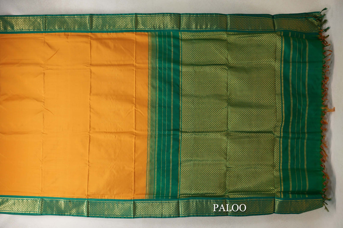 Turmeric Yellow with Emerald Green Borders Ten Yards Silk Saree paloo