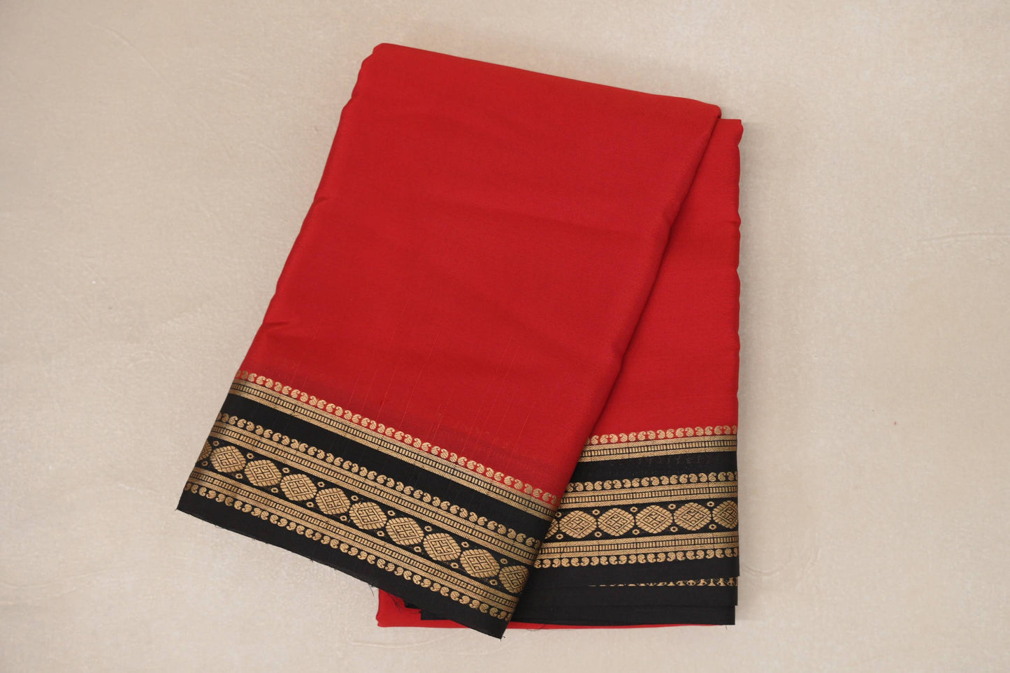 folded Red Mysore Silk Saree