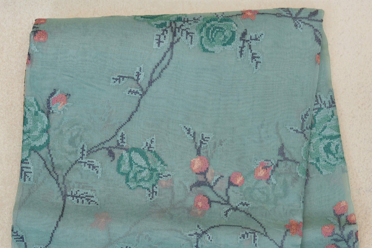 Pastel Aqua Green with Multi color Borders Organza Silk Saree body