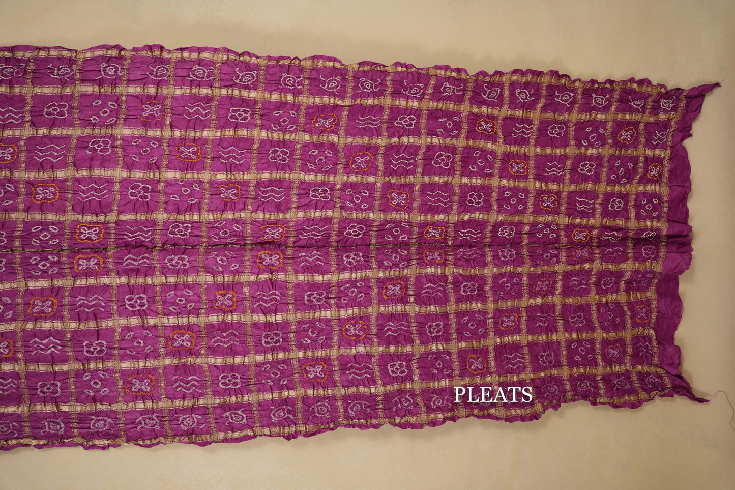 gaji silk bandhani saree pleats