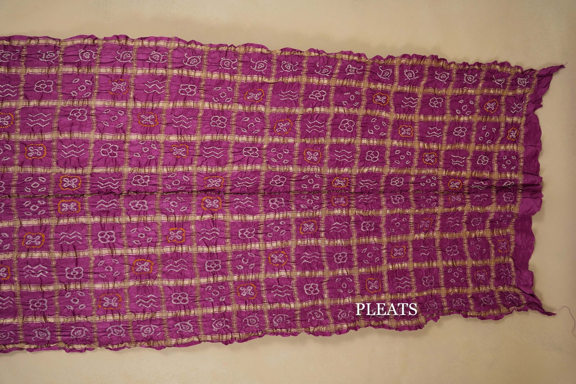 gaji silk bandhani saree pleats