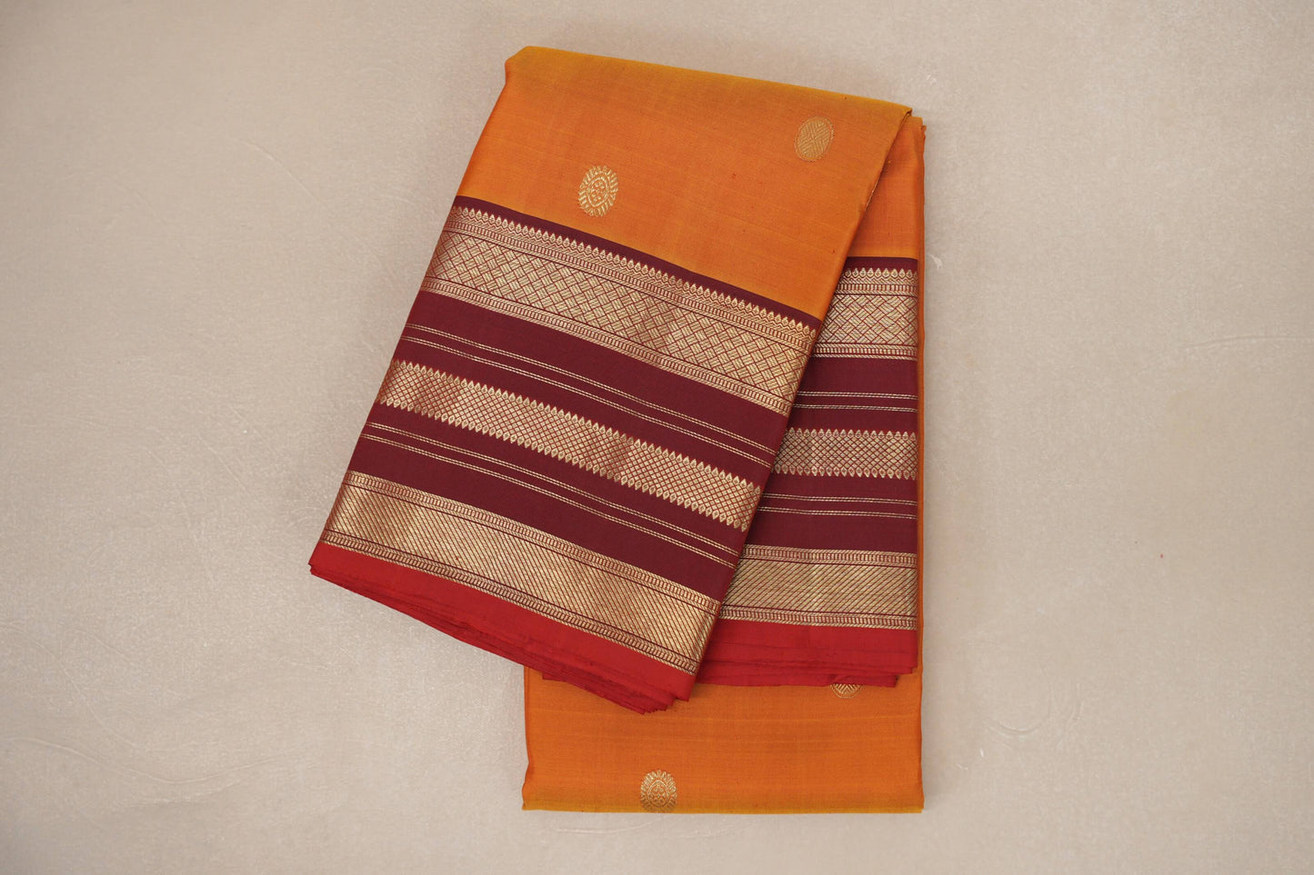 folded Dual Tone Red and Mustard Vintage Kanjivaram Silk Saree