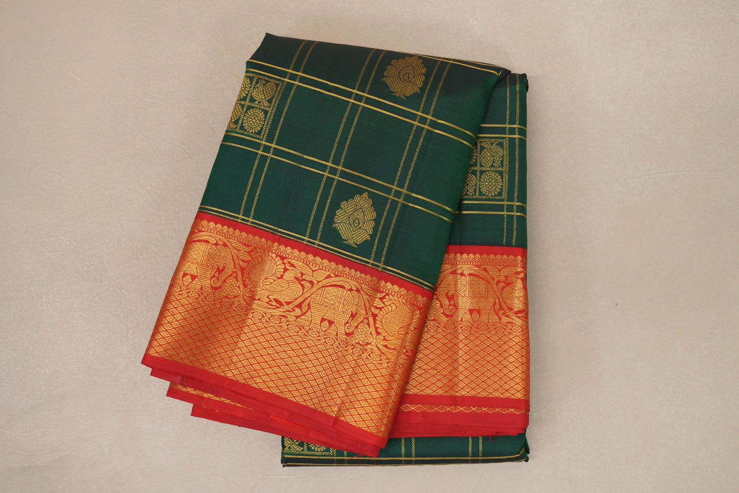 folded Bottle Green Vintage Kanjivaram Silk Saree  