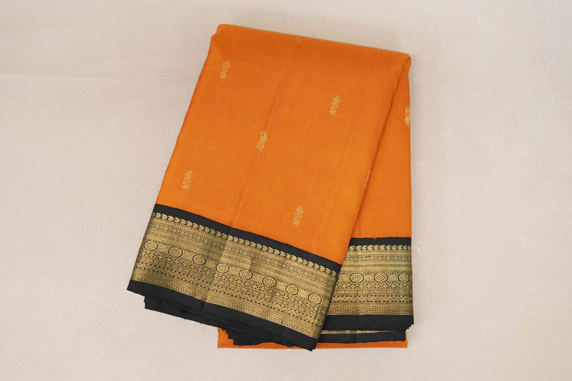 folded Deep Mango Orange Vintage Kanjivaram Silk Saree