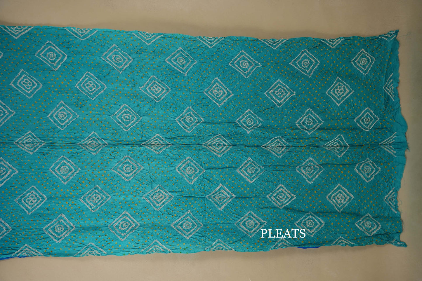 gaji silk bandhani saree pleats