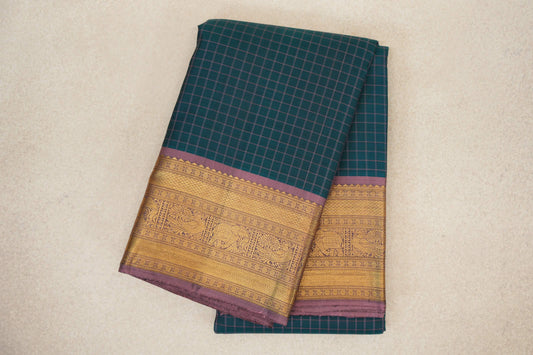 folded Peacock Green Vintage Kanjivaram Silk Saree
