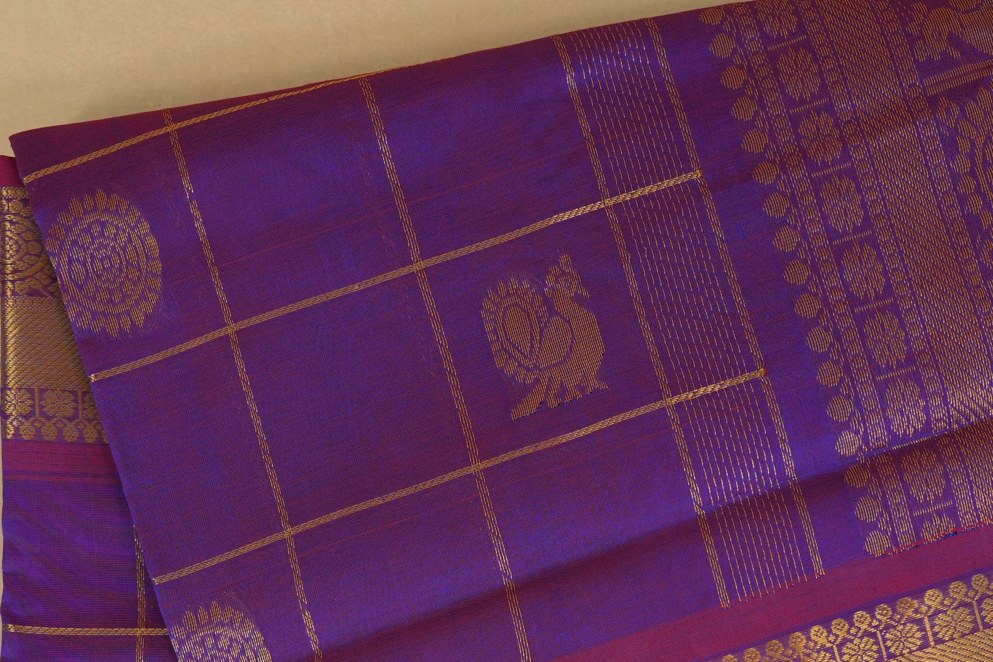 Purple fabric with gold patterns and  silk cotton , nine and a half yards saree, close up