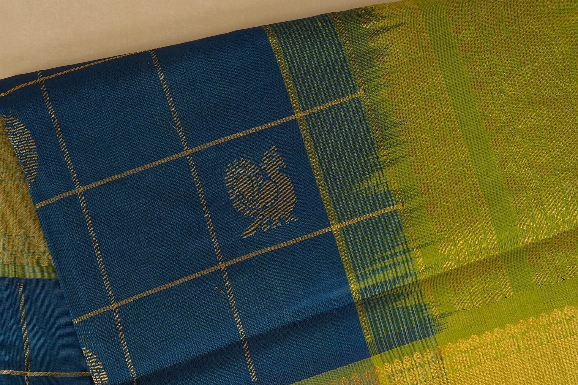 Blue and green checkered fabric ,  silk cotton , nine and a half yards saree, close up 
