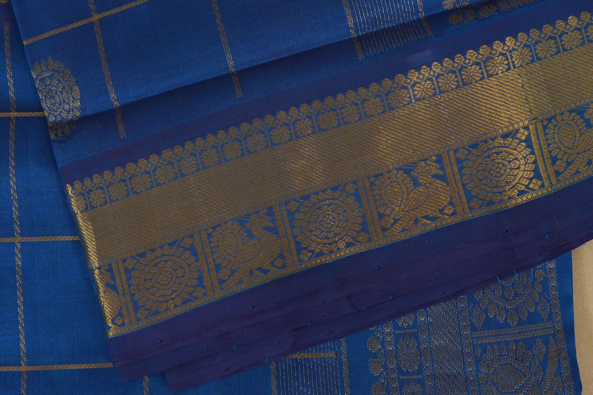Blue saree with gold patterns,  silk cotton , nine and a half yards saree, close up