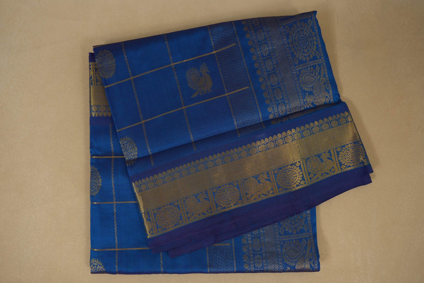 Blue saree with intricate patternsand checks, silk cotton , nine and a half yards saree, folded