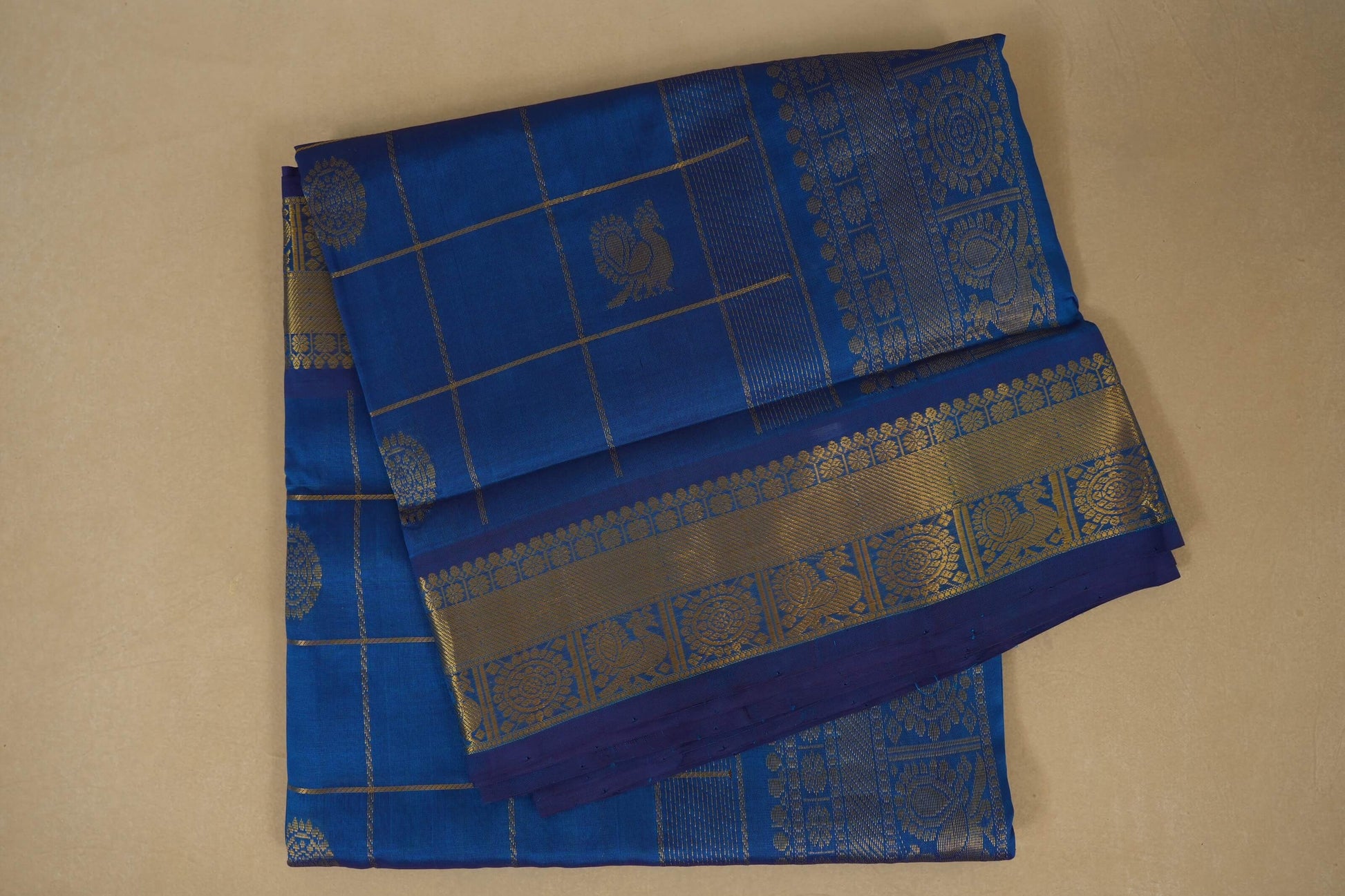 Blue saree with intricate patternsand checks, silk cotton , nine and a half yards saree, folded