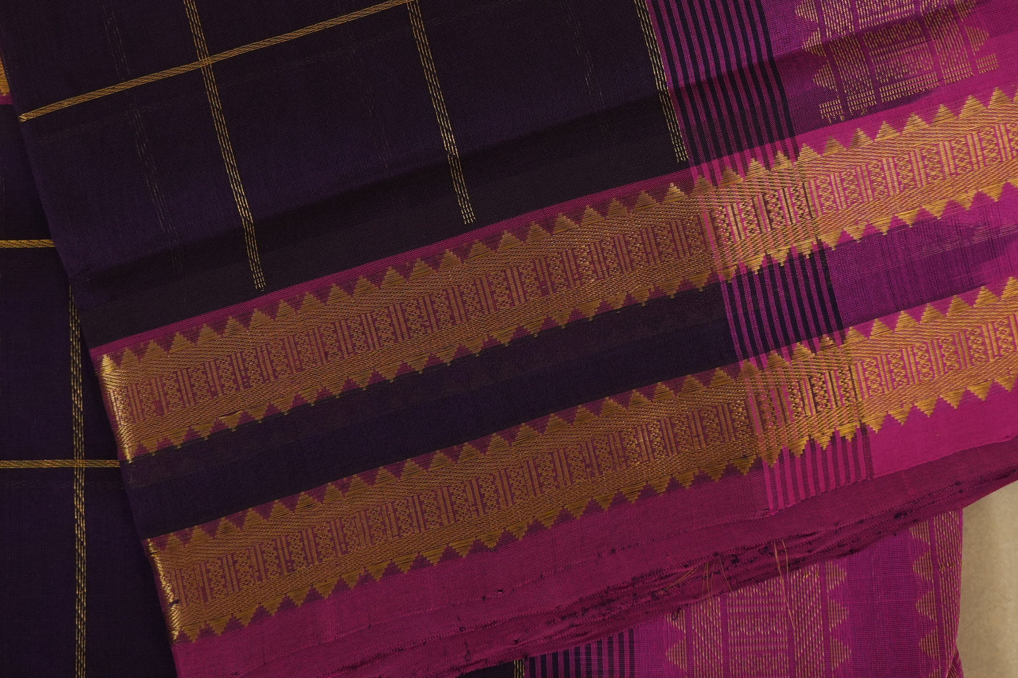Close-up of a purple and gold woven saree,  silk cotton , nine and a half yards saree, close up
