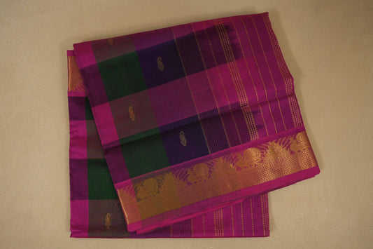 Traditional saree with a checkered pattern , silk cotton , nine and a half yards saree, folded
