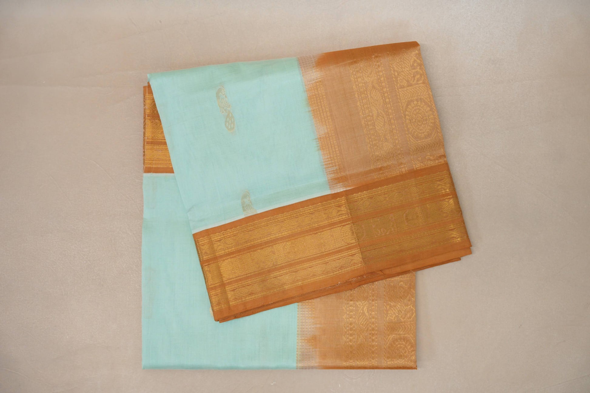 folded Pastel Sea Green with Copper Gold Borders Vintage Silk Cotton Saree