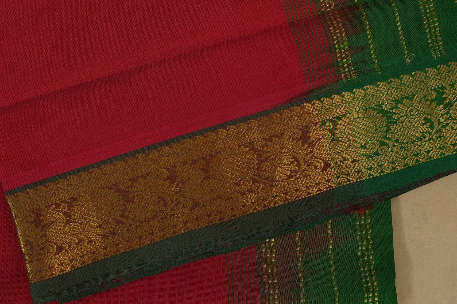 Red and green saree with a gold border, silk cotton , nine and a half yards saree close up