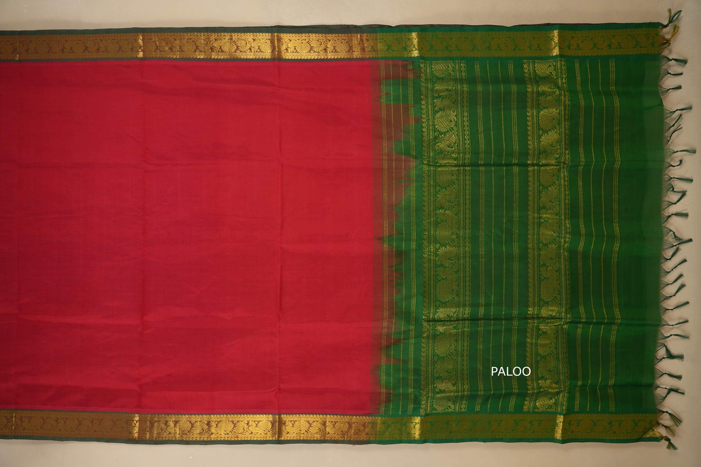 Red and green saree with gold border and green plaoo, silk cotton , nine and a half yards saree