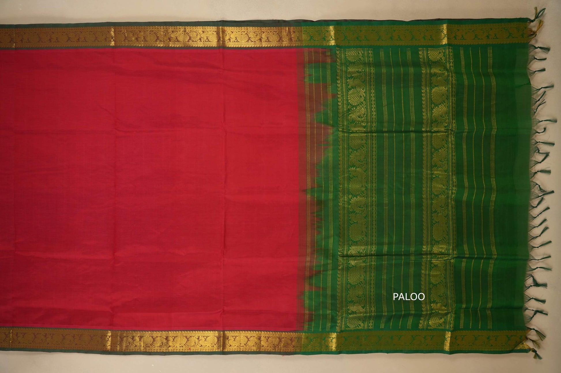 Red and green saree with gold border and green plaoo, silk cotton , nine and a half yards saree