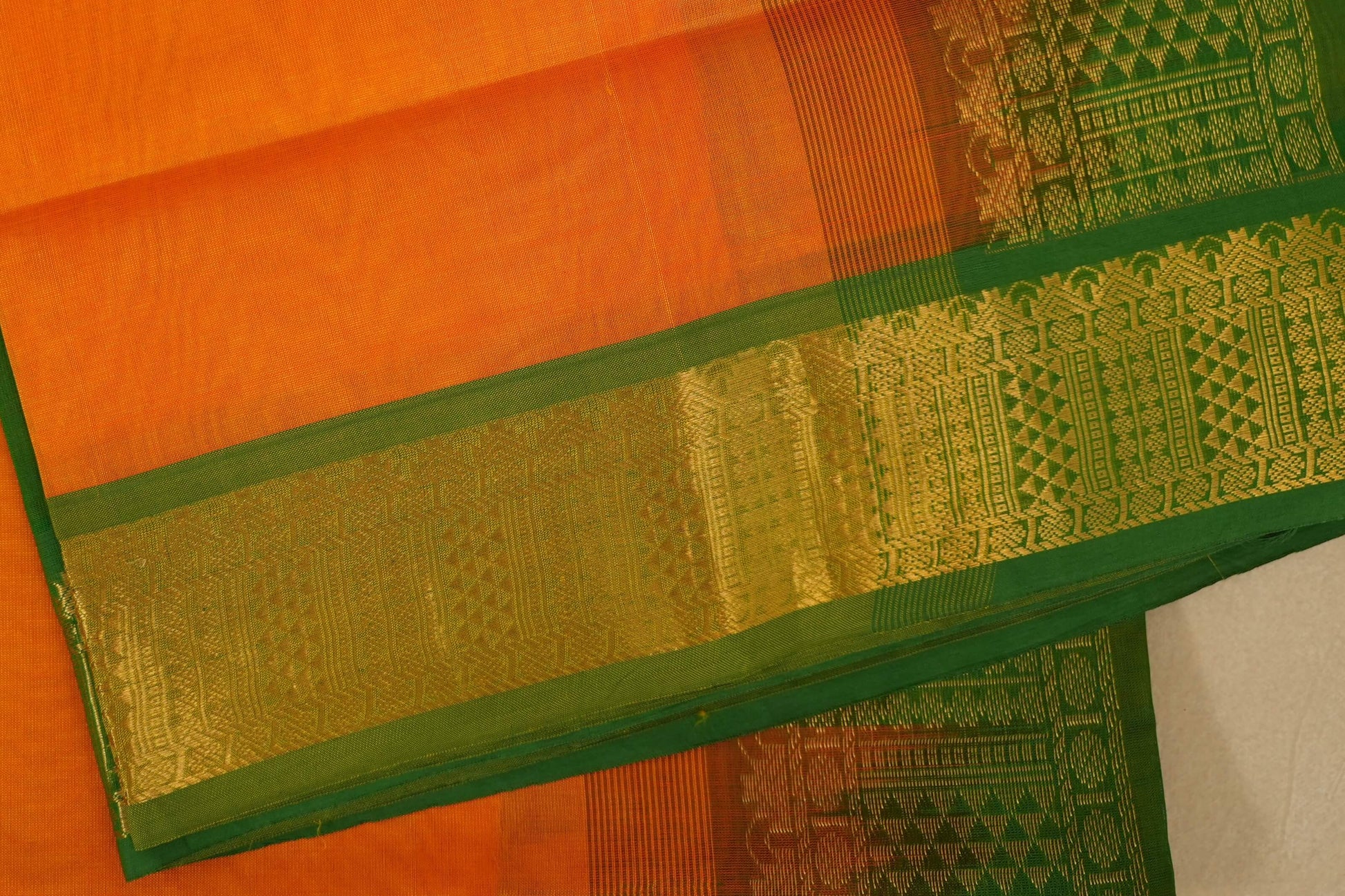 Orange and green traditional saree with intricate patterns, silk cotton , nine and a half yards saree