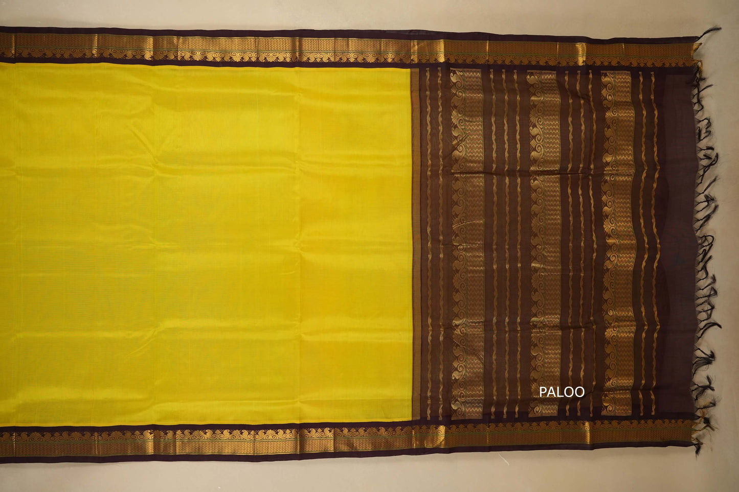 Yellow saree with a brown border with paloo, silk cotton , nine and a half yards saree