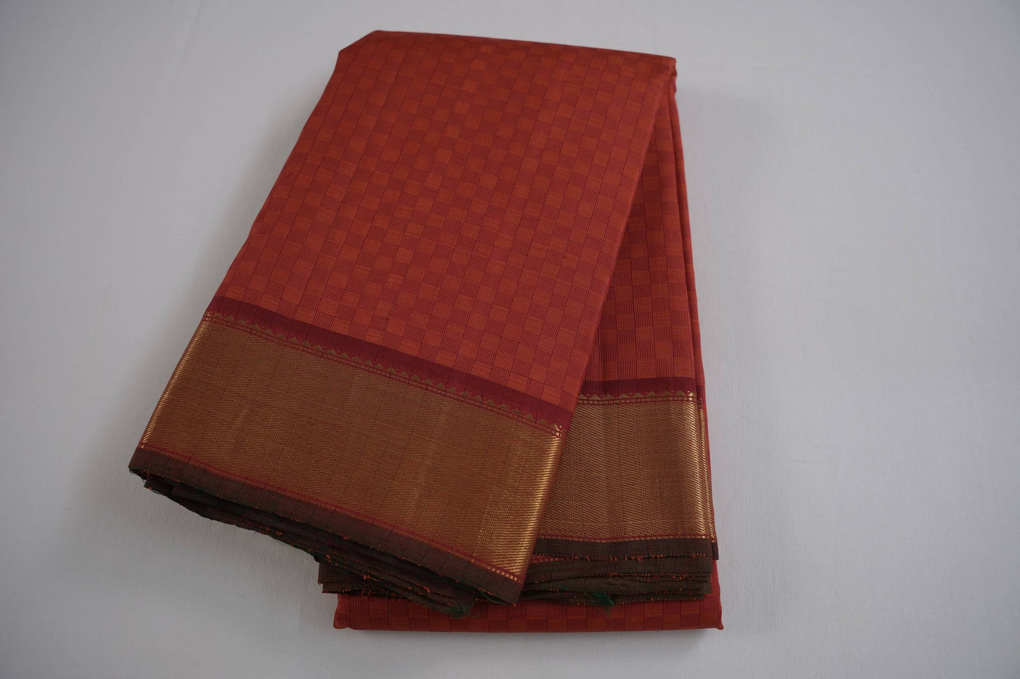 Rust kanchipuram silk saree