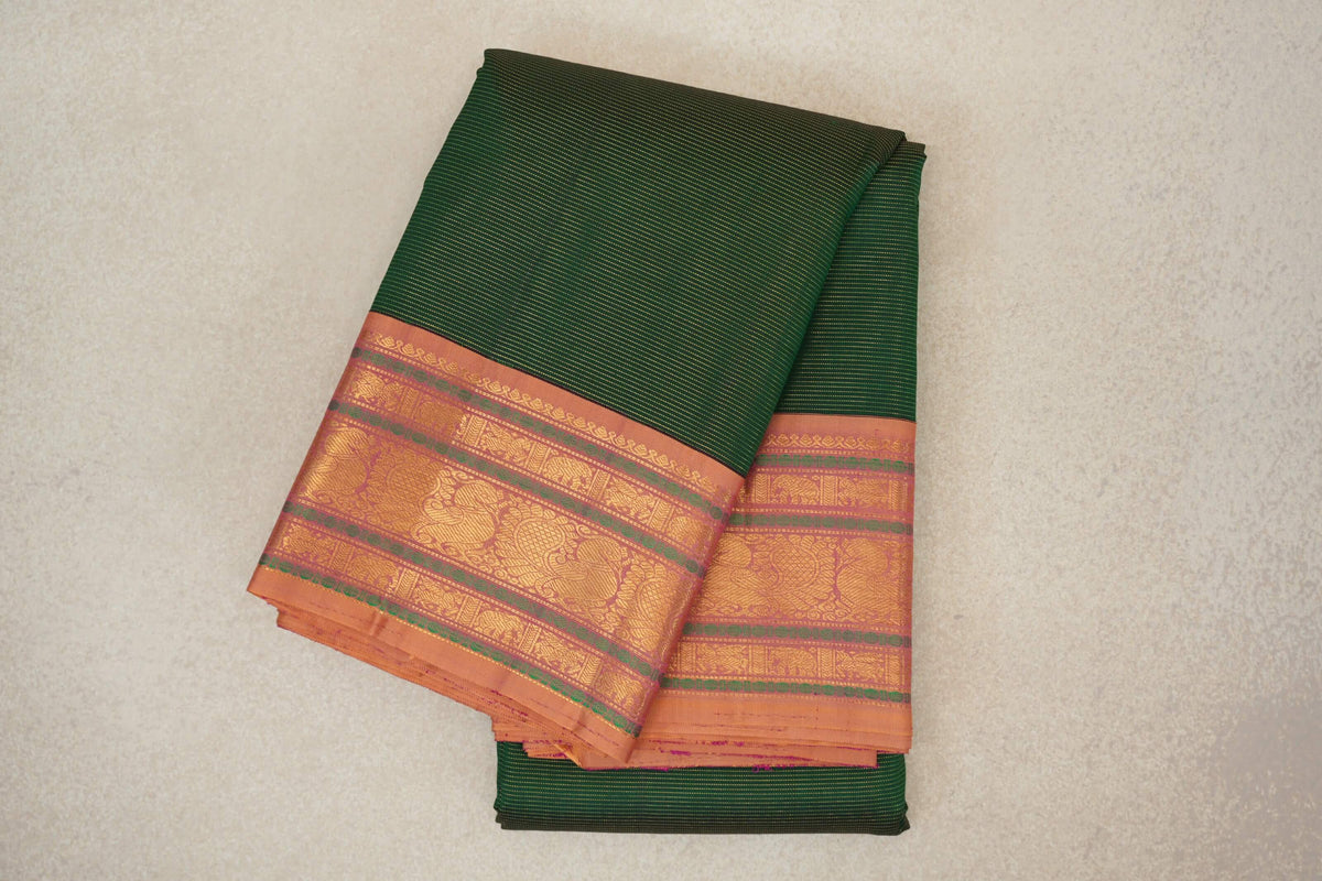 folded Dark Bottle Green Vintage Kanjivaram Silk Saree