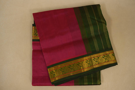 Pink and green saree with a decorative border , silk cotton , nine and a half yards saree