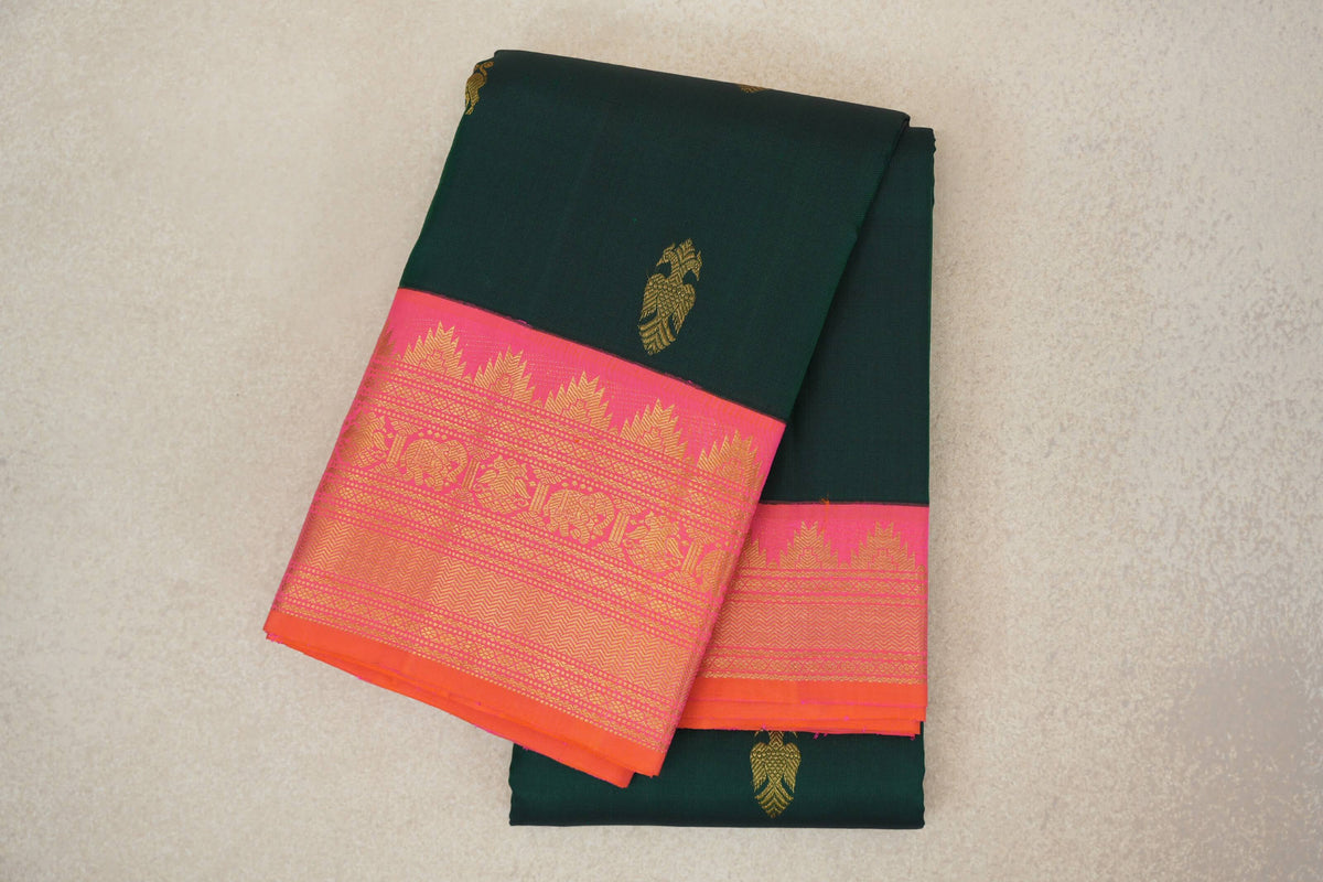 folded Dark Bottle Green Vintage Kanjivaram Silk Saree