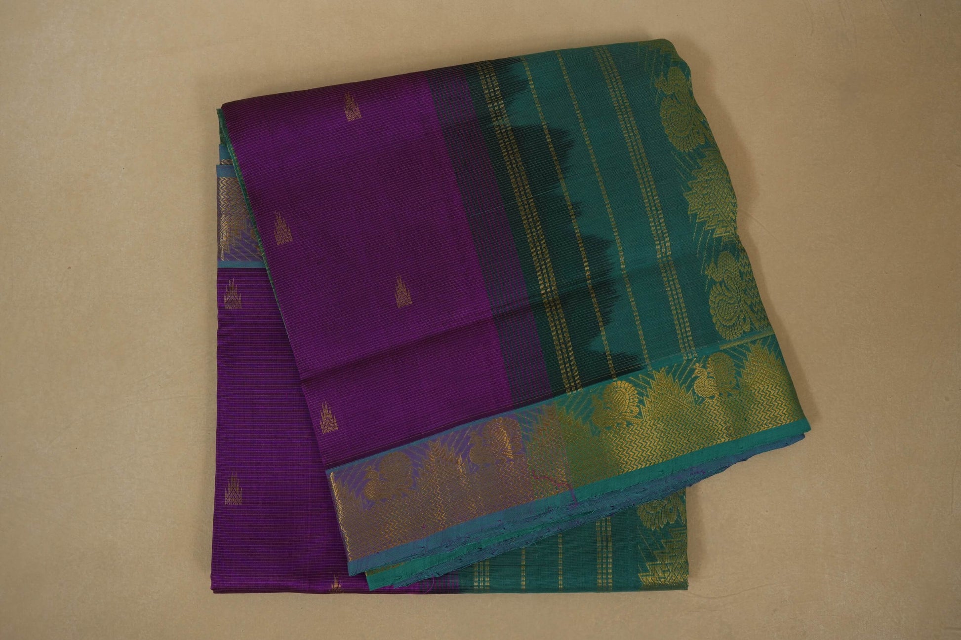 Purple and green saree with gold patterns , silk cotton, nine and a half yards, folded