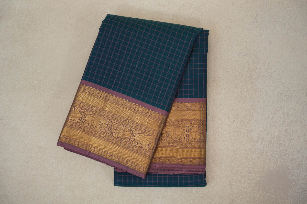 folded Peacock Green Vintage Kanjivaram Silk Saree