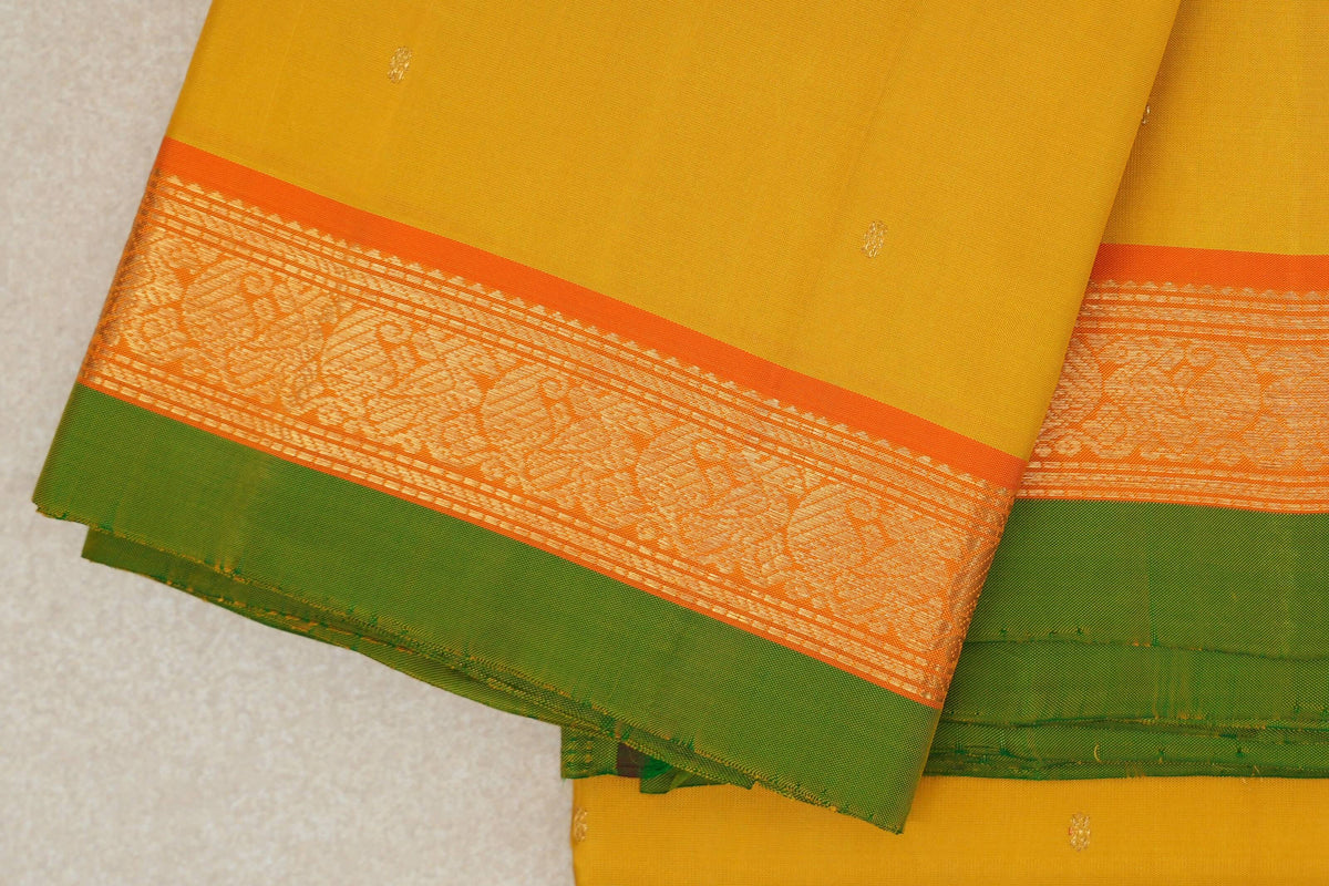 Turmeric Yellow with Bright Orange Borders with Leaf Green Selvedge Vintage Kanjivaram Silk Saree by Shreenivas Silks border