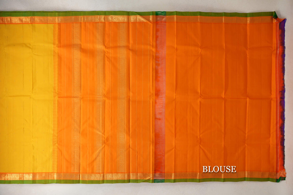 Turmeric Yellow with Bright Orange Borders with Leaf Green Selvedge Vintage Kanjivaram Silk Saree by Shreenivas Silks blouse