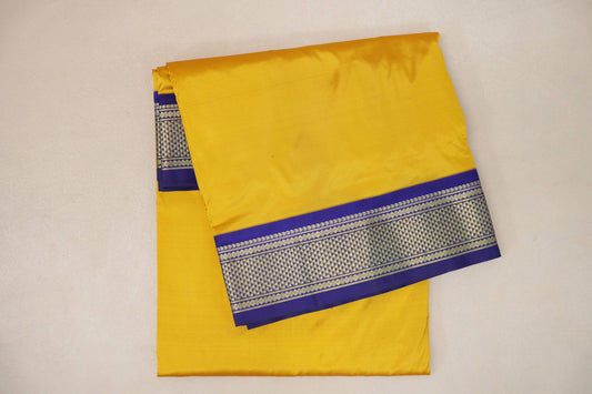 folded Bright yellow Ten Yards Silk Cotton saree 